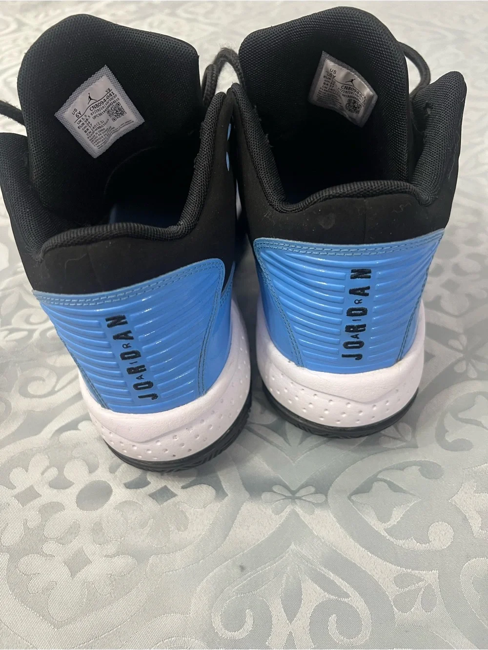 Jordan Black and Light Blue High-Top Sneakers size 6